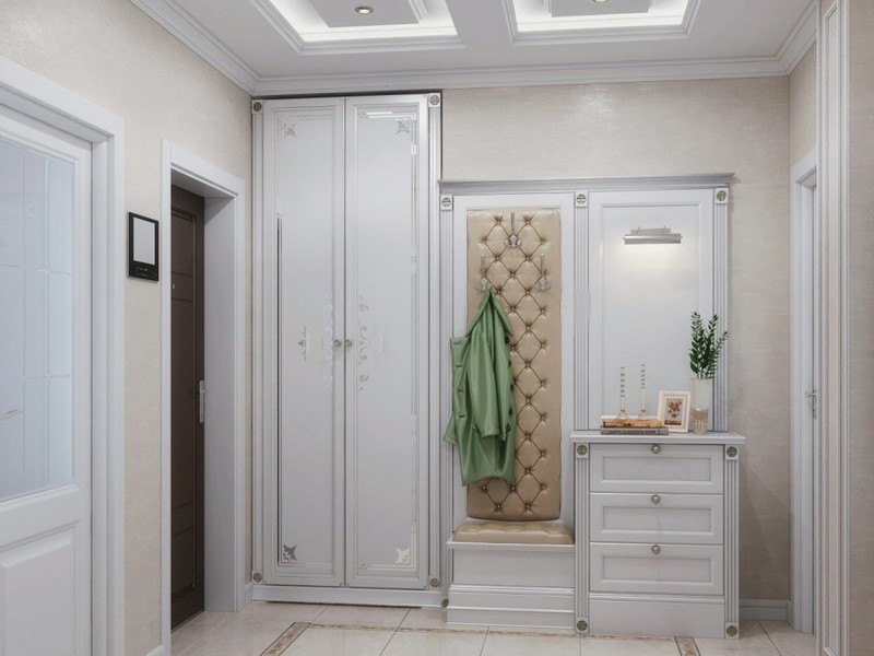 Small entrance hall with a white wardrobe