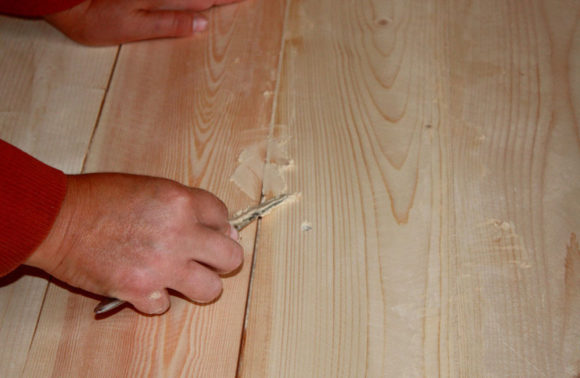 hoe een houten vloer te herstellen