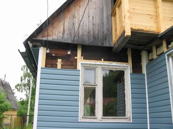 πώς να καλύψει ένα ξύλινο σπίτι